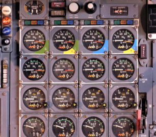 Aeroplane cockpit showing the analogue flight instruments